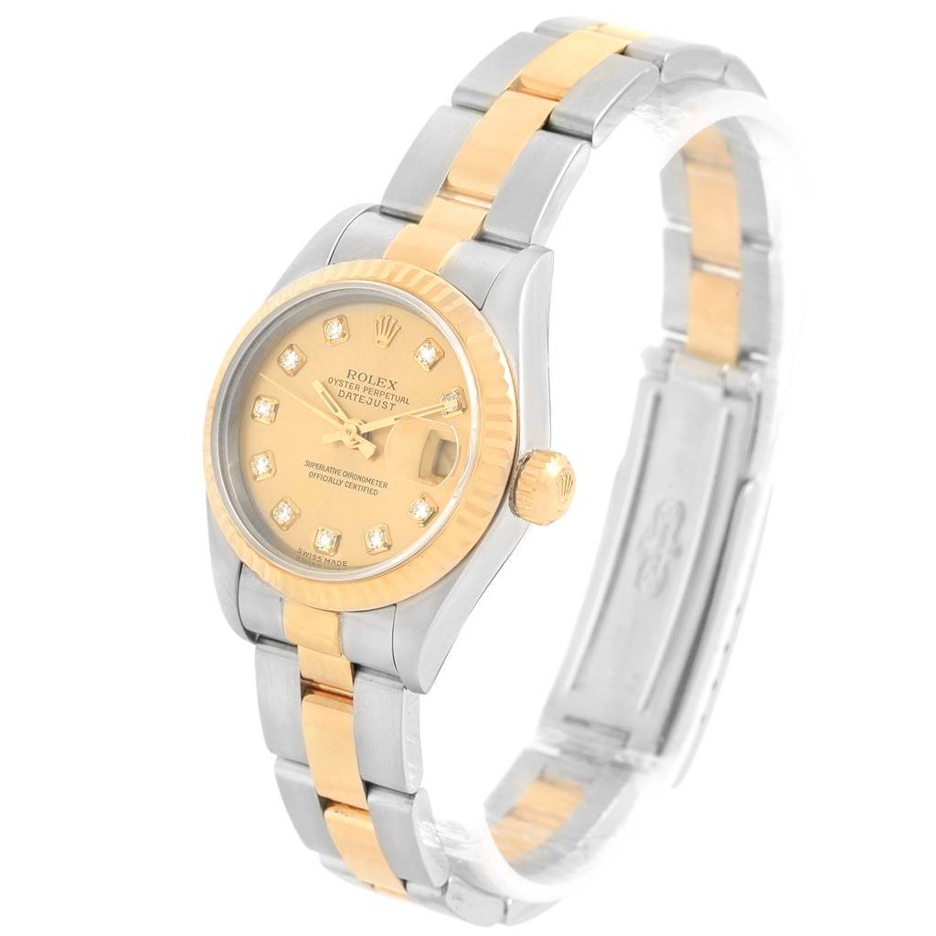 The Rolex Datejust 69173 Women's Stainless Steel Champagne Dial 69173 Women's Stainless Steel Champagne Dial watch is shown from a front-side angle, highlighting its dial, bezel, bracelet, and clasp.