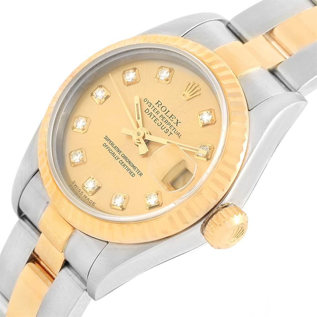 The image shows a close-up view of the dial, bezel, crown, and part of the bracelet of a Rolex Datejust 69173 Women's Stainless Steel Champagne Dial 69173 Women's Stainless Steel Champagne Dial watch.