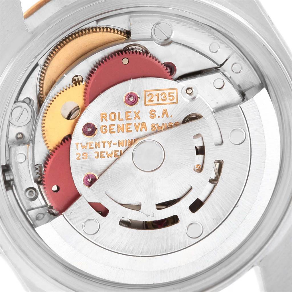 This image shows the inner mechanical movement of a Rolex Datejust 69173 Women's Stainless Steel Champagne Dial 69173 Women's Stainless Steel Champagne Dial watch from a back angle, highlighting gears and components.