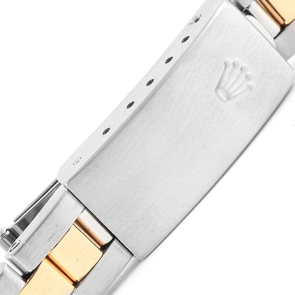 This image shows a close-up of the clasp and part of the bracelet of a Rolex Datejust 69173 Women's Stainless Steel Champagne Dial 69173 Women's Stainless Steel Champagne Dial watch.