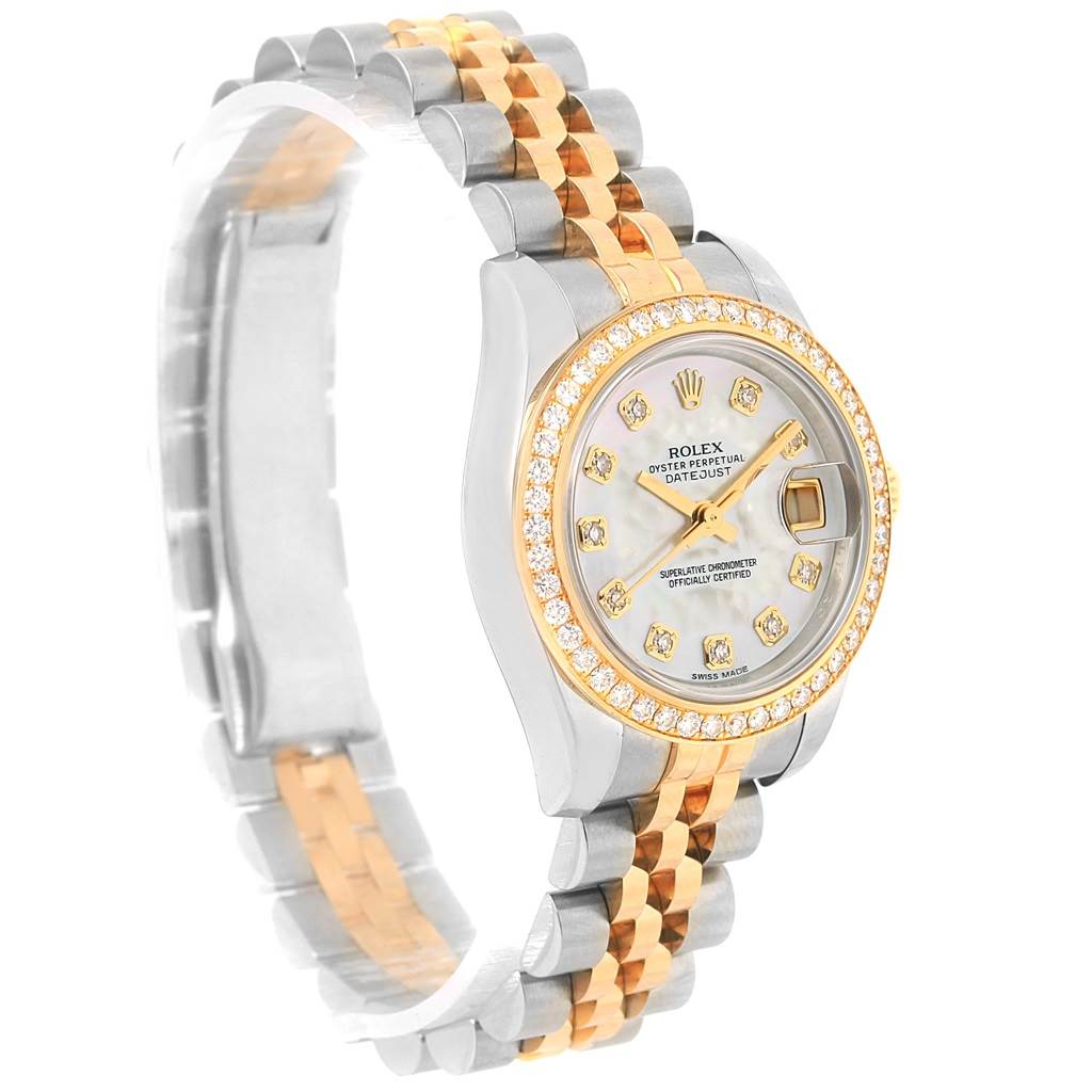 The Rolex Datejust 179383 Women's Steel and Gold (two tone) Mother of Pearl Dial 179383 Women's Steel and Gold (two tone) Mother of Pearl Dial watch is shown from a side angle, highlighting its two-tone bracelet, diamond-set bezel, and detailed face.