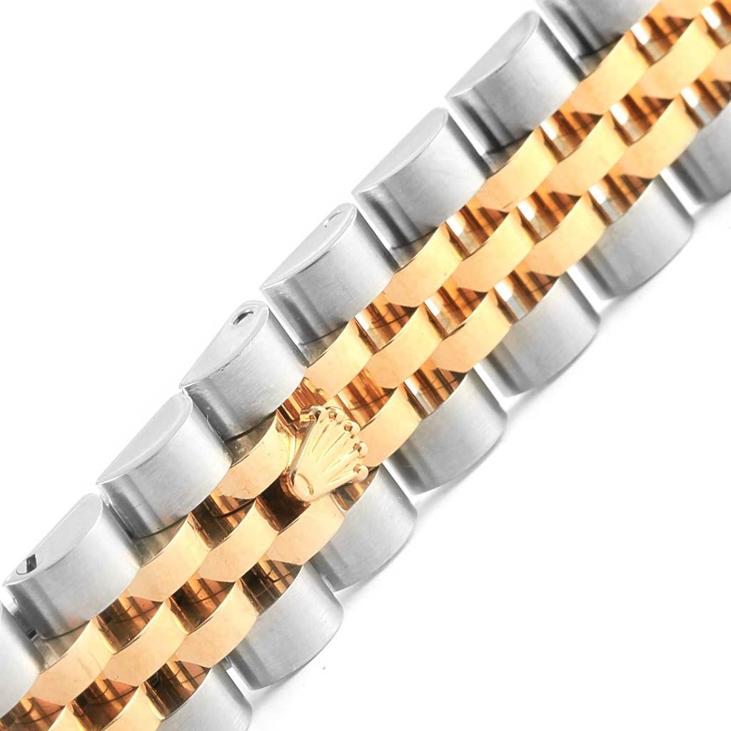 The image shows a close-up of the two-tone bracelet with the gold Rolex crown on a Rolex Datejust 179173 Women's Steel and Gold (two tone) Silver Dial 179173 Women's Steel and Gold (two tone) Silver Dial watch.