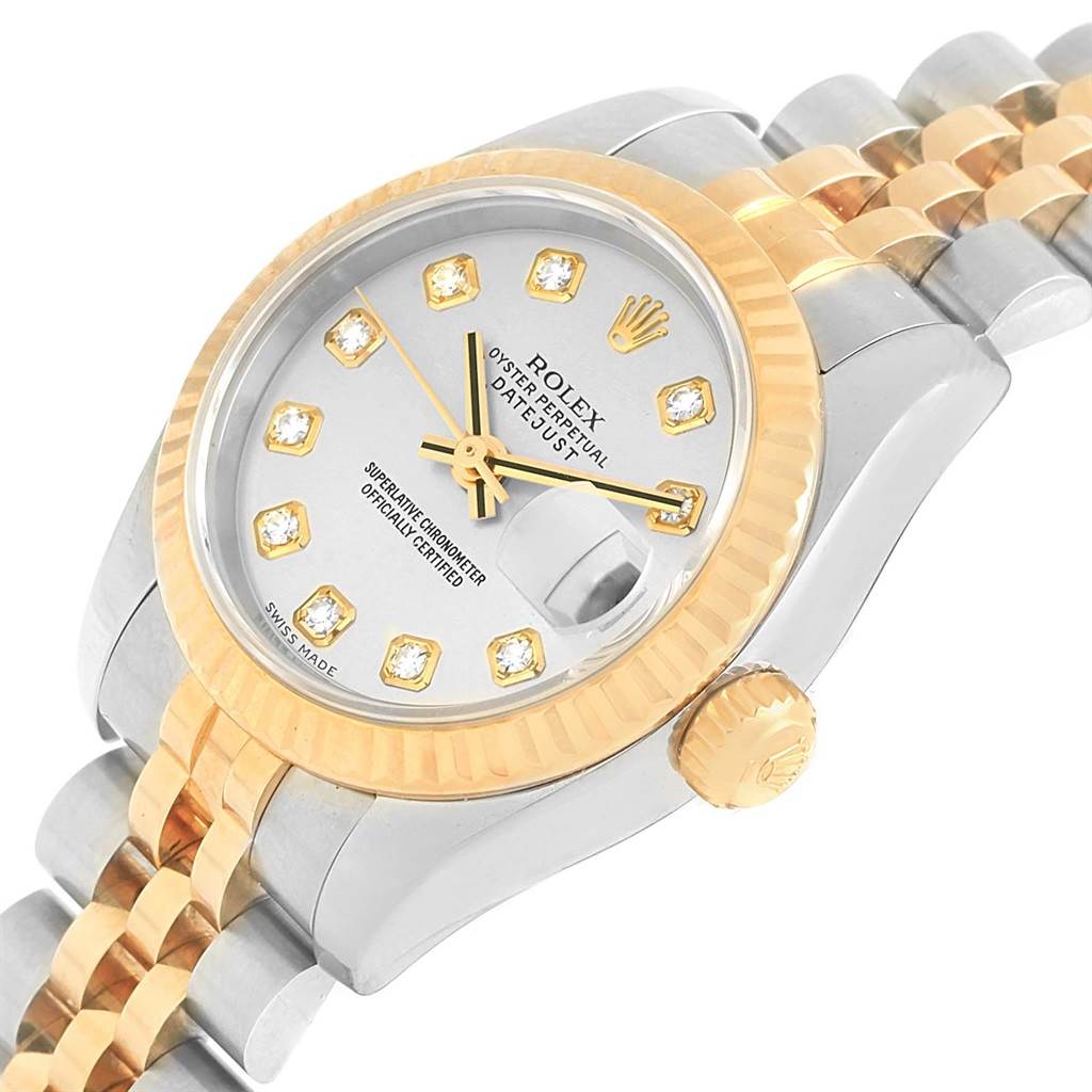 The image shows a Rolex Datejust 179173 Women's Steel and Gold (two tone) Silver Dial 179173 Women's Steel and Gold (two tone) Silver Dial watch at a slight angle, highlighting its gold bezel, diamond markers, and part of the bracelet.