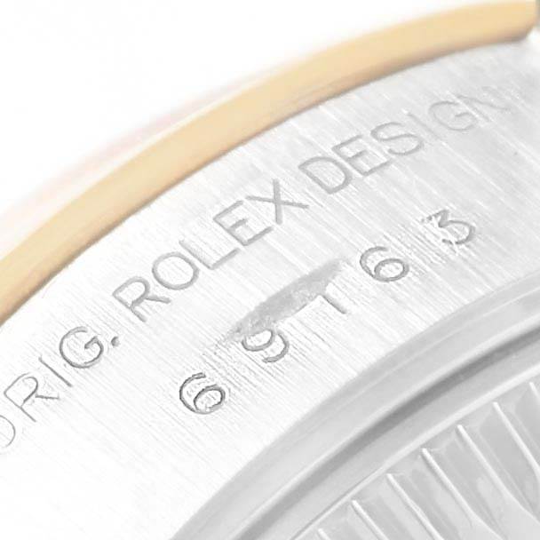 This close-up angle shows the engraved model number and design inscription on the side of the Rolex Datejust 69163 Women's Stainless Steel White Dial 69163 Women's Stainless Steel White Dial watch case.
