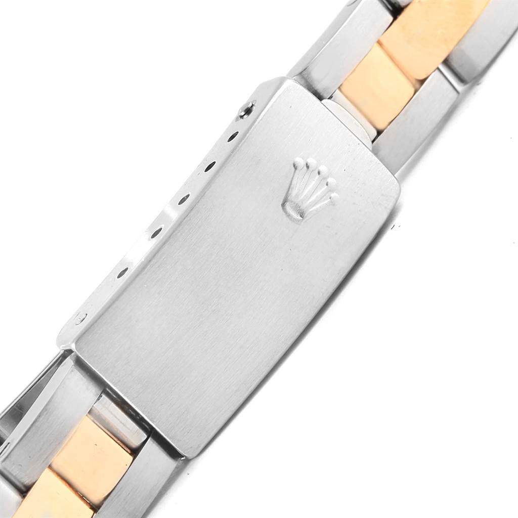 This image shows the clasp of a Rolex Datejust 69163 Women's Stainless Steel White Dial 69163 Women's Stainless Steel White Dial watch bracelet, featuring a combination of metal links.