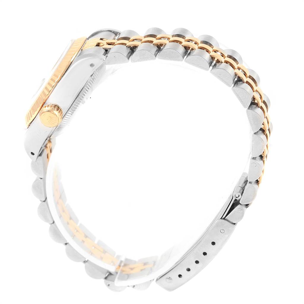 This image shows the side view of the Rolex Datejust 69173 Women's Stainless Steel White Dial 69173 Women's Stainless Steel White Dial watch, highlighting the crown, bezel, and two-tone bracelet.