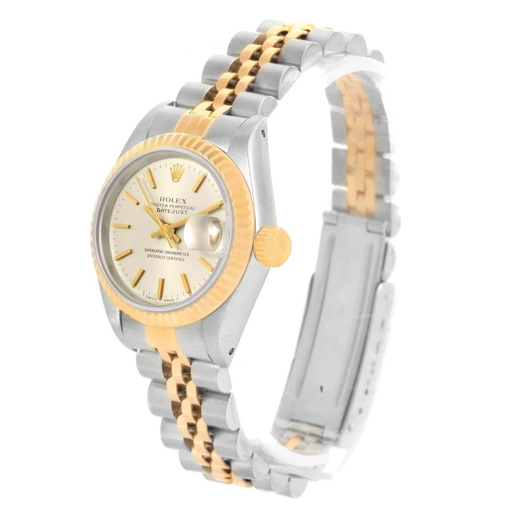 The image shows a side angle of a Rolex Datejust 69173 Women's Stainless Steel Silver Dial 69173 Women's Stainless Steel Silver Dial watch, highlighting its dual-tone band and fluted bezel.