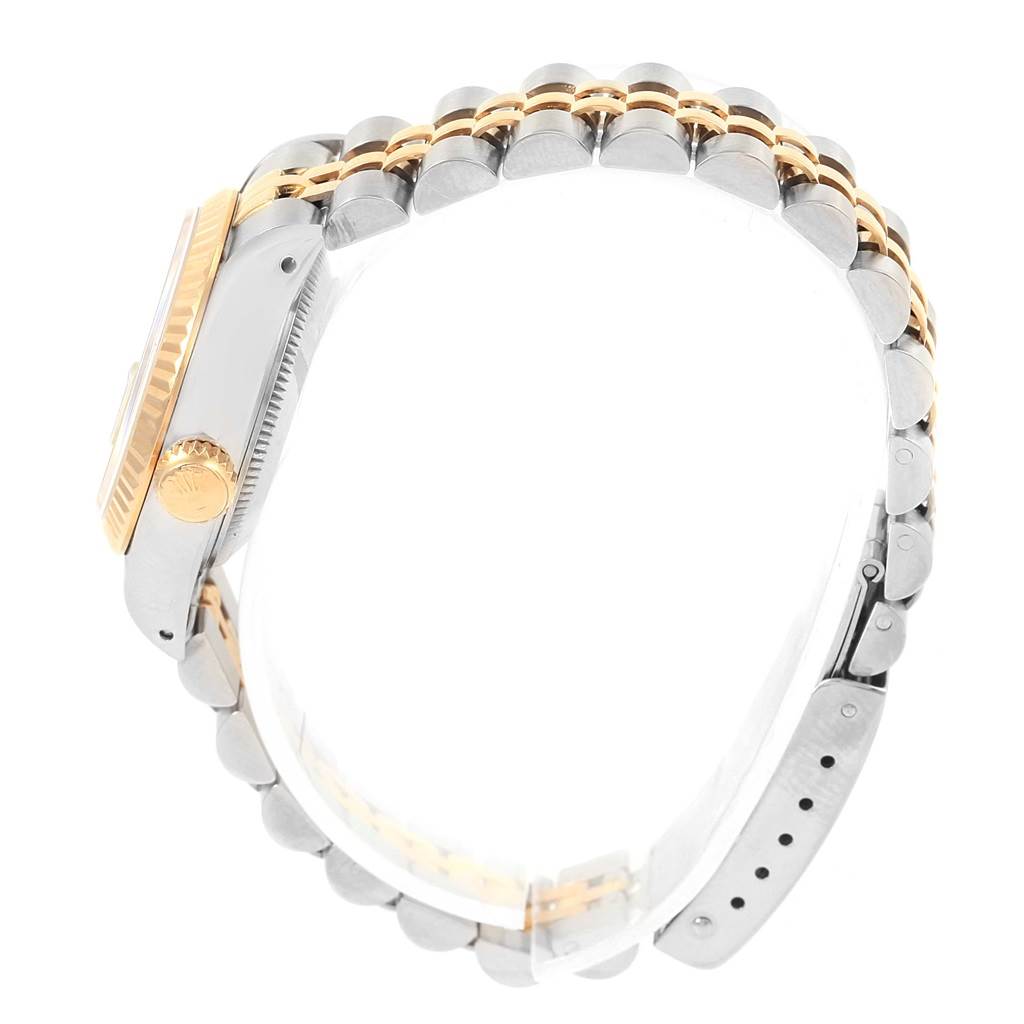 The image shows the side view of the Rolex Datejust 69173 Women's Stainless Steel Silver Dial 69173 Women's Stainless Steel Silver Dial watch, highlighting the case, crown, and two-tone bracelet.