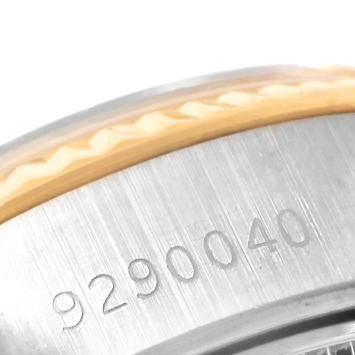 The image shows a close-up of the serial number engraving on the case of a Rolex Datejust 69173 Women's Stainless Steel White Dial 69173 Women's Stainless Steel White Dial watch.