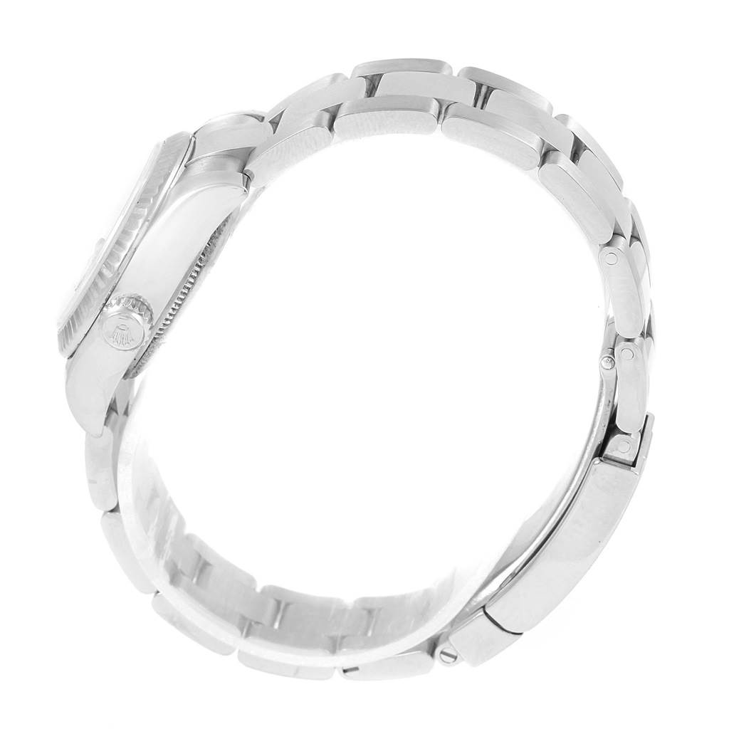 The image shows a side view of the Rolex Datejust 179174 Women's Stainless Steel White Dial 179174 Women's Stainless Steel White Dial watch, highlighting its case, bezel, and bracelet.