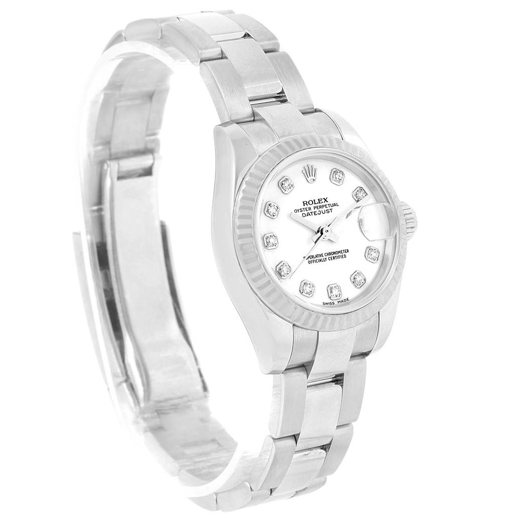 This image shows a Rolex Datejust 179174 Women's Stainless Steel White Dial 179174 Women's Stainless Steel White Dial watch from an angled side view, displaying its bracelet, case, dial, and bezel.