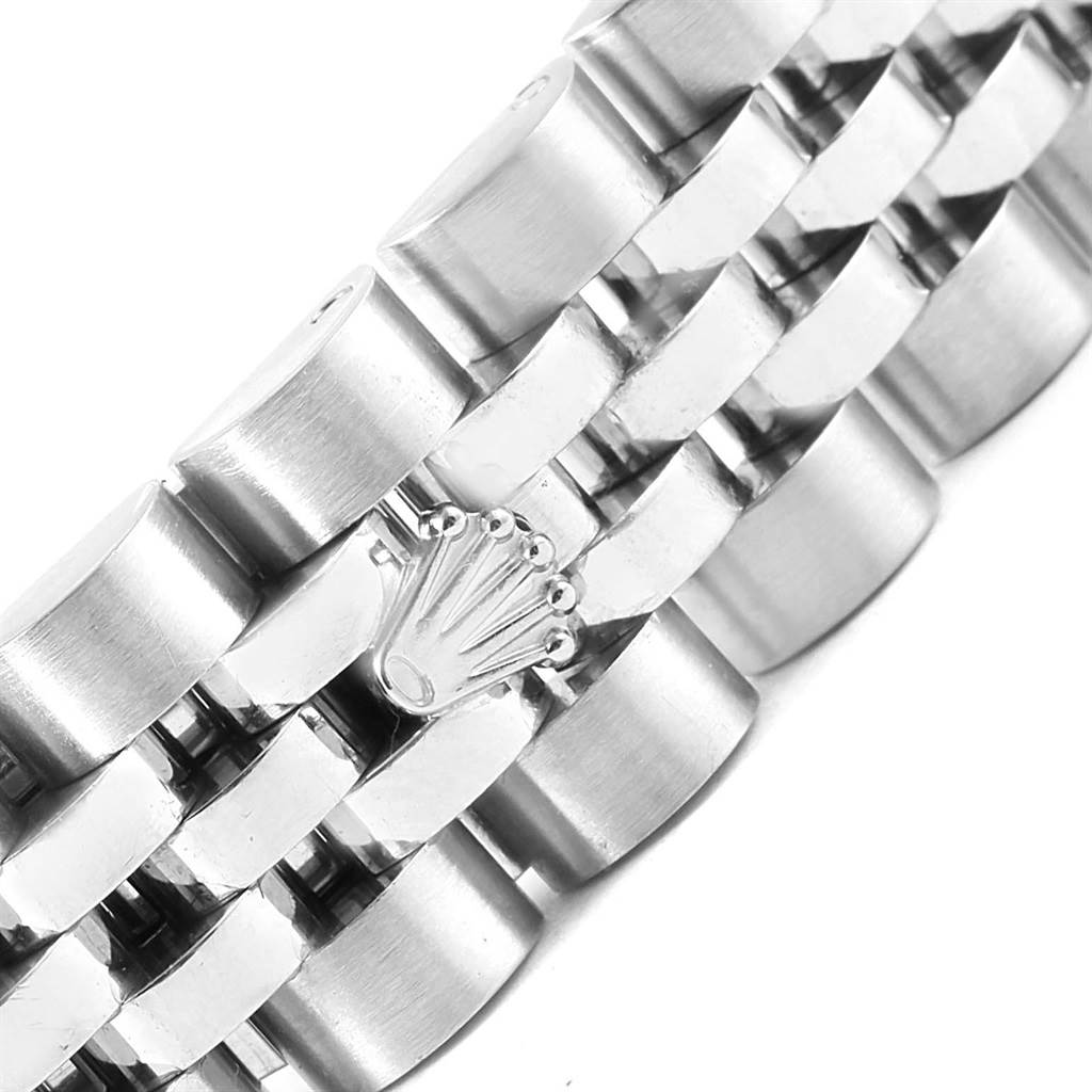 This image shows a close-up of the bracelet clasp with the Rolex logo on a Datejust model watch.