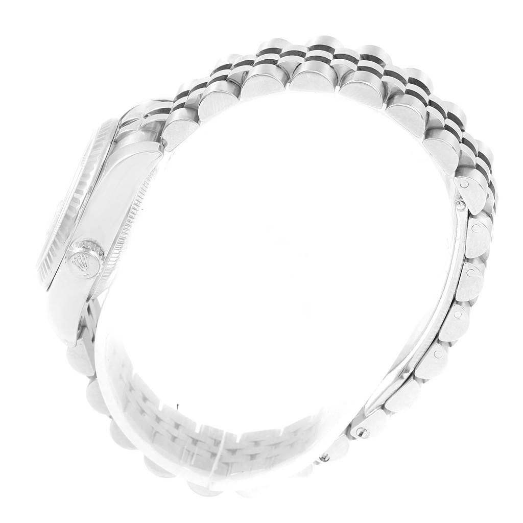 This image shows the side profile and bracelet of a Rolex Datejust 179174 Women's Stainless Steel Silver Dial 179174 Women's Stainless Steel Silver Dial watch with its winding crown and Jubilee bracelet visible.