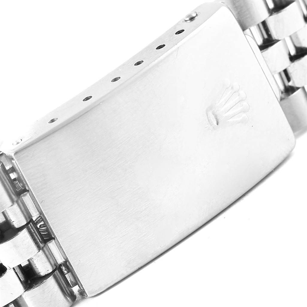 This image shows a close-up of the clasp of a Rolex Datejust 16234 Men's Stainless Steel White Dial 16234 Men's Stainless Steel White Dial bracelet from an angled top view.