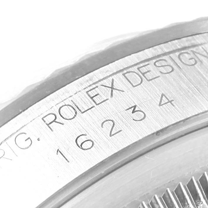 The image shows a close-up of the case side engraving of a Rolex Datejust 16234 Men's Stainless Steel White Dial 16234 Men's Stainless Steel White Dial watch, highlighting the model number 16234.