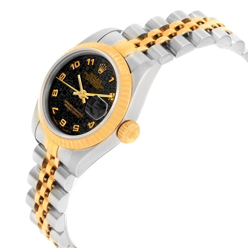 This image shows a Rolex Datejust 79173 Women's Stainless Steel Black Dial 79173 Women's Stainless Steel Black Dial watch at a slight angle, featuring its black dial, gold fluted bezel, and two-tone bracelet.