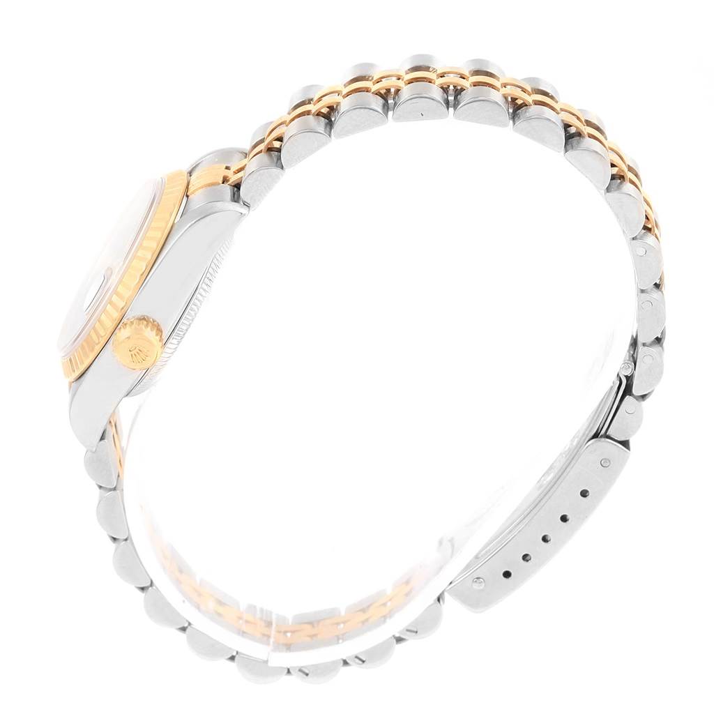 This image shows a side view of the Rolex Datejust 79173 Women's Stainless Steel Black Dial 79173 Women's Stainless Steel Black Dial watch, highlighting its two-tone bracelet and crown.