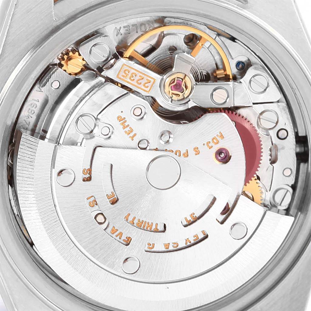 This image shows a close-up of the movement mechanism of a Rolex Datejust 79173 Women's Stainless Steel Champagne Dial 79173 Women's Stainless Steel Champagne Dial watch from the back.