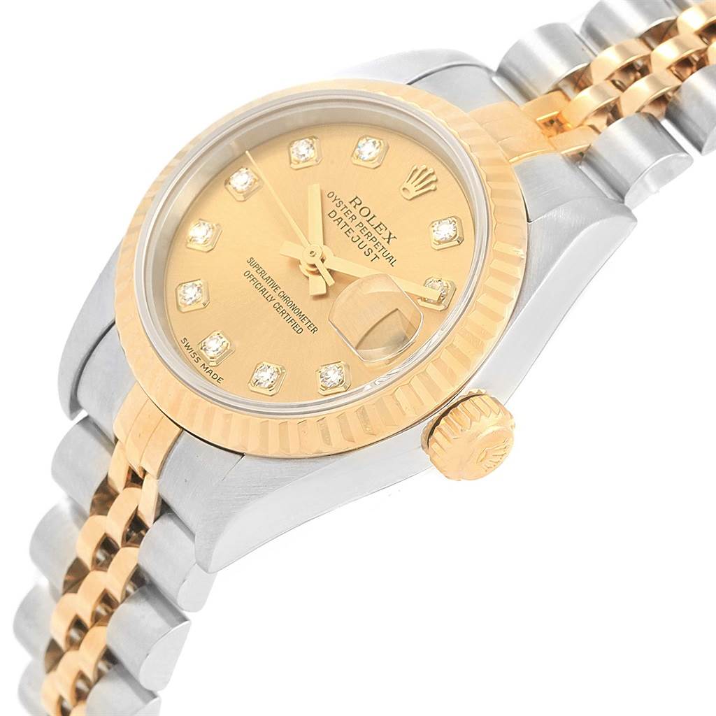 The image shows a close-up angle of a Rolex Datejust 79173 Women's Stainless Steel Champagne Dial 79173 Women's Stainless Steel Champagne Dial watch, highlighting the dial, bezel, crown, and part of the bracelet.
