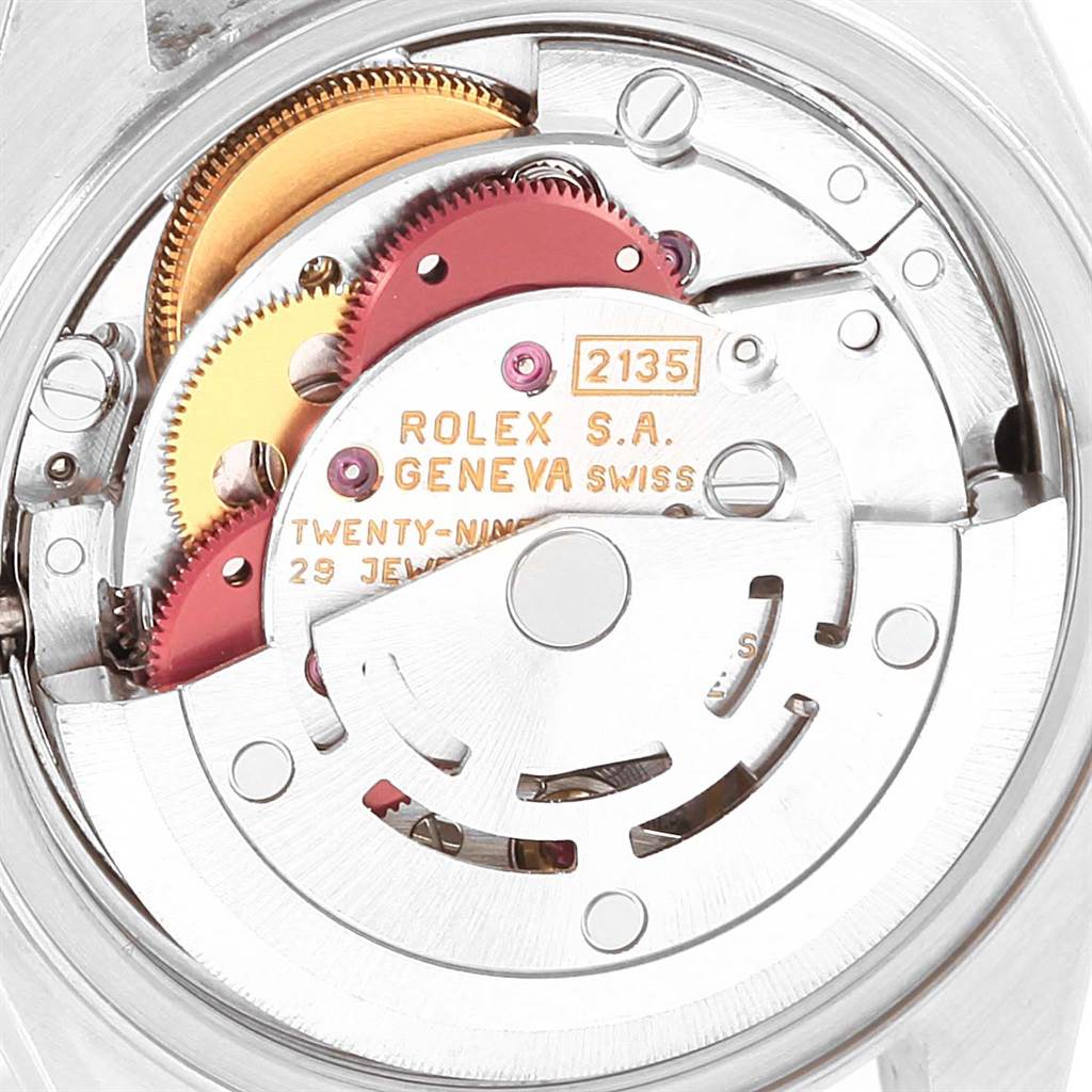 This close-up image shows the inner mechanical movement of a Rolex Datejust 69173 Women's Stainless Steel Black Dial 69173 Women's Stainless Steel Black Dial watch, highlighting gears and components.