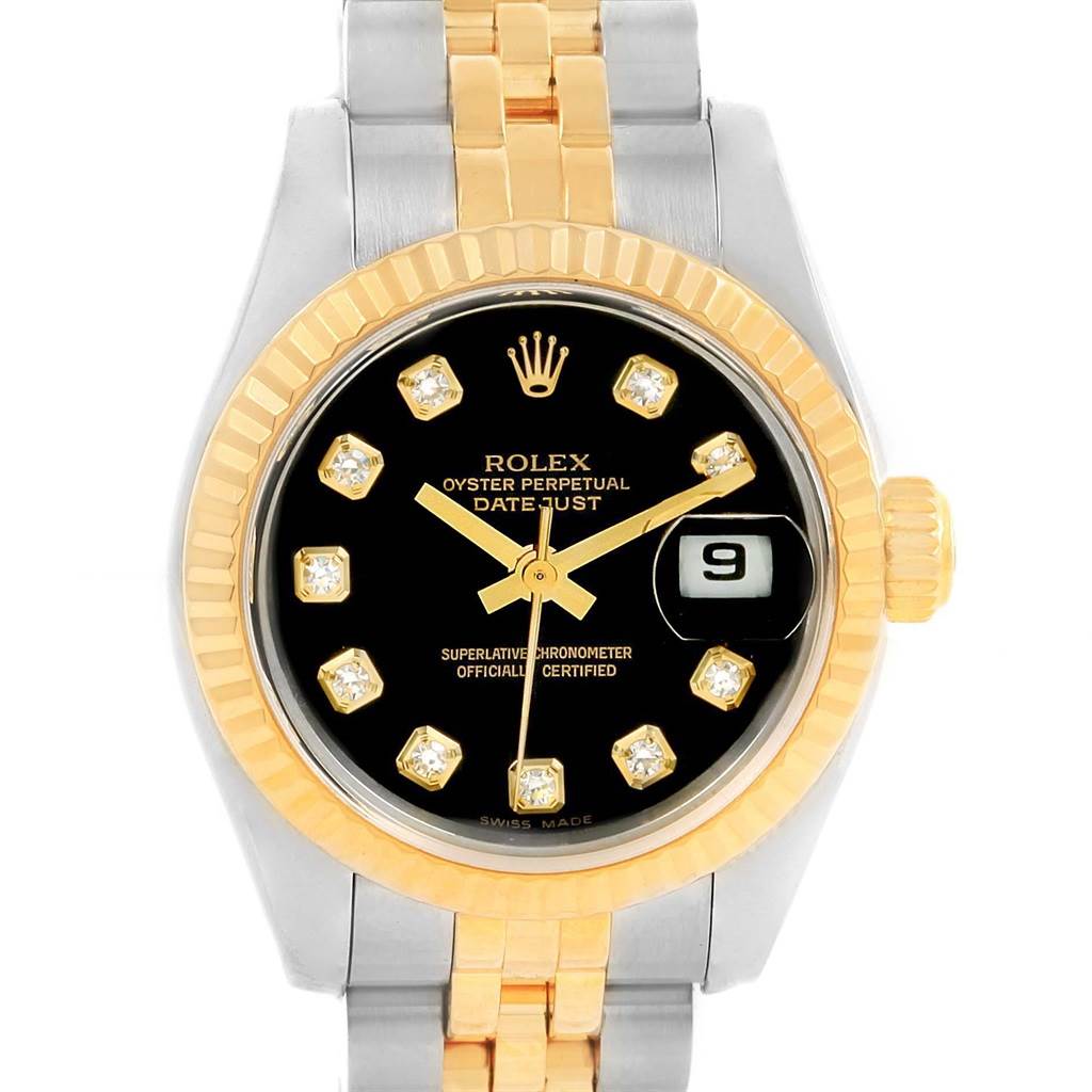 The image shows a frontal view of a Rolex Datejust 69173 Women's Stainless Steel Black Dial 69173 Women's Stainless Steel Black Dial watch featuring a two-tone bracelet, black dial, and gold fluted bezel.