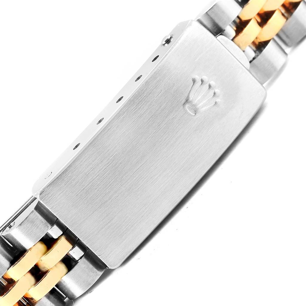 The image shows a close-up of the clasp and part of the bracelet of a Rolex Datejust 69173 Women's Stainless Steel Blue Dial 69173 Women's Stainless Steel Blue Dial watch.