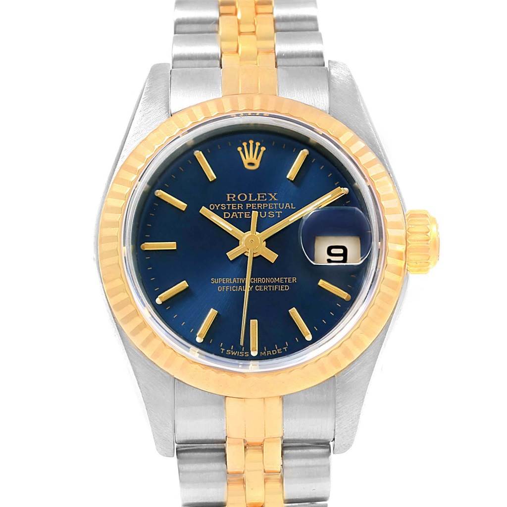 The image shows a Rolex Datejust 69173 Women's Stainless Steel Blue Dial 69173 Women's Stainless Steel Blue Dial watch from the front, detailing its blue dial, gold bezel, and two-tone bracelet.