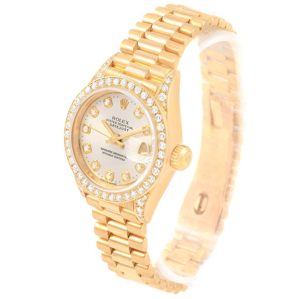 The image shows a Rolex Datejust 69238 Women's Yellow Gold Silver Dial 69238 Women's Yellow Gold Silver Dial watch at a slight angle, displaying its face, bezel, and bracelet.