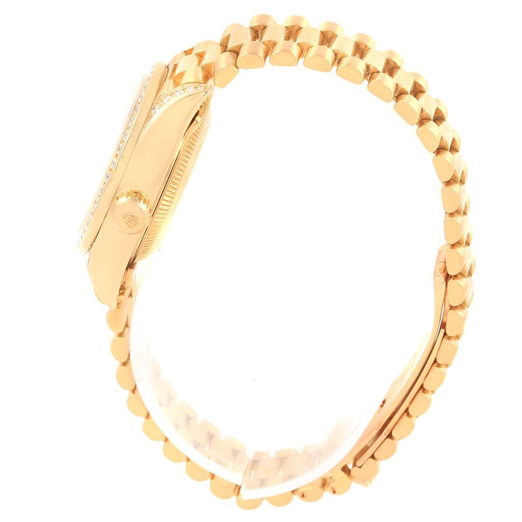 The image shows a side view of the Rolex Datejust 69238 Women's Yellow Gold Silver Dial 69238 Women's Yellow Gold Silver Dial watch, focusing on the case, bezel, crown, and part of the bracelet.