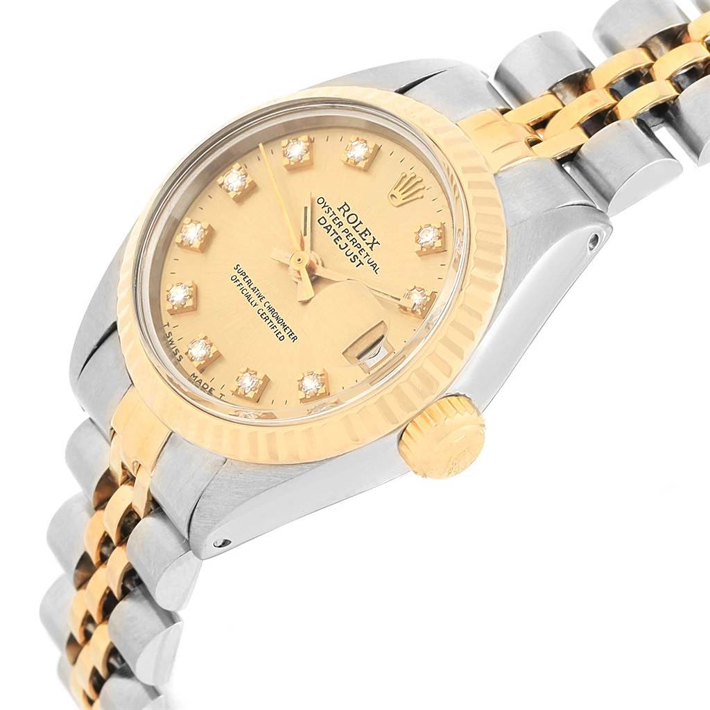 The image shows a side angle of the Rolex Datejust 6917 Women's Stainless Steel Champagne Dial 6917 Women's Stainless Steel Champagne Dial watch, highlighting its dial, crown, and part of its two-tone bracelet.