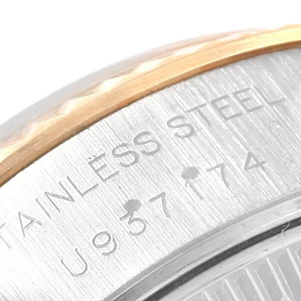 This image shows a close-up of the steel case and part of the bezel of a Rolex Datejust 69173 Women's Stainless Steel Champagne Dial 69173 Women's Stainless Steel Champagne Dial watch.