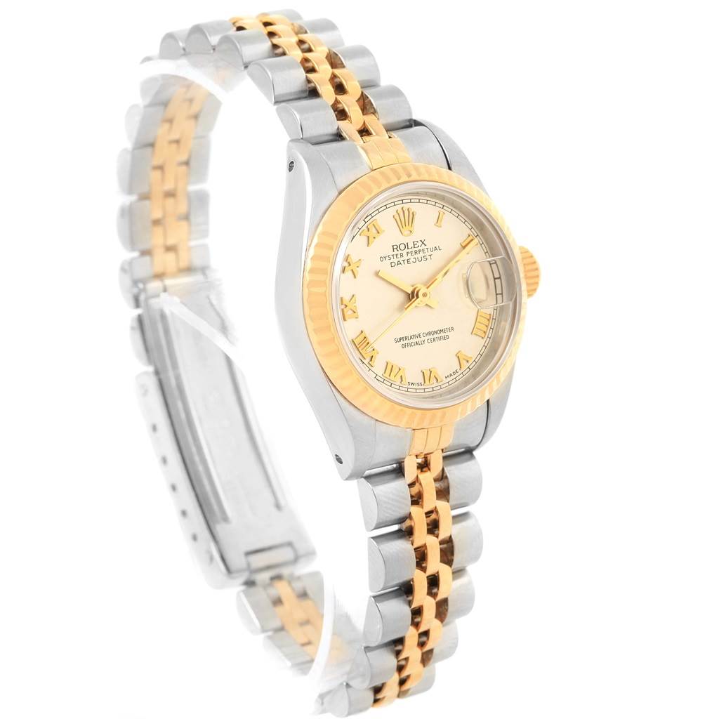 The Rolex Datejust 69173 Women's Stainless Steel Beige Dial 69173 Women's Stainless Steel Beige Dial watch is shown at an angle focusing on the dial, bezel, and two-tone bracelet.