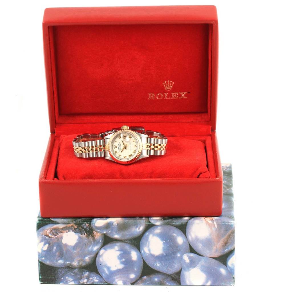 The Rolex Datejust 69173 Women's Stainless Steel Beige Dial 69173 Women's Stainless Steel Beige Dial watch is displayed in an open, red box, showing the front dial and bracelet.