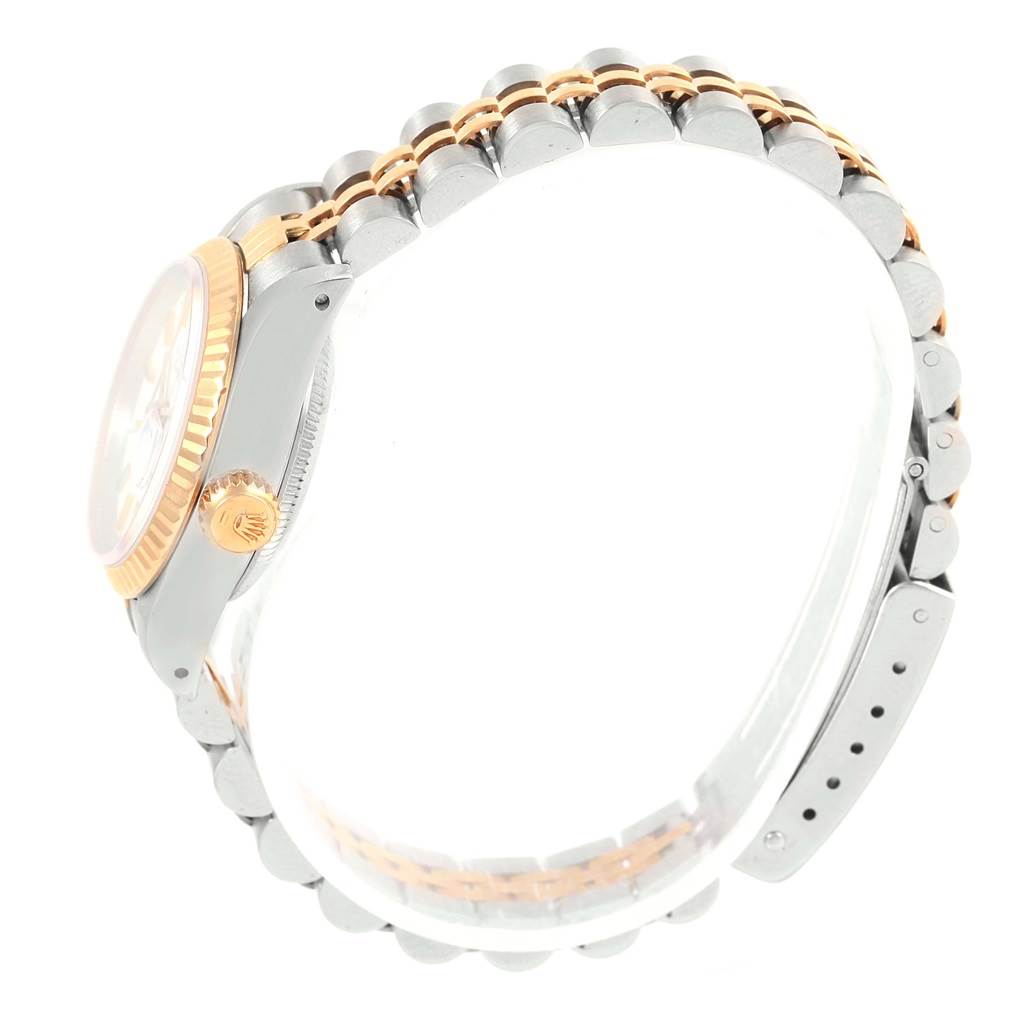 This image shows a side view of the Rolex Datejust 69173 Women's Stainless Steel White Dial 69173 Women's Stainless Steel White Dial watch, highlighting its crown, case, and two-tone bracelet.