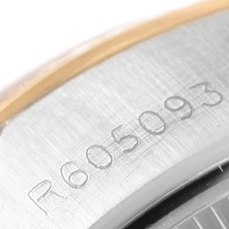 The image shows a close-up of the serial number engraving on the side of a Rolex Datejust 69173 Women's Stainless Steel White Dial 69173 Women's Stainless Steel White Dial watch case.
