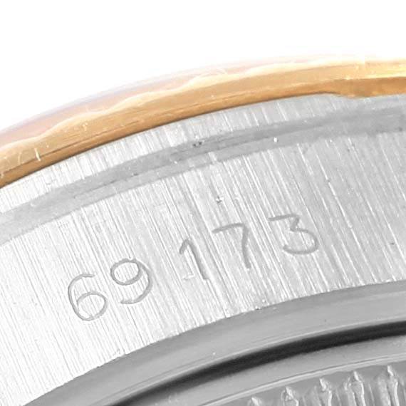 This close-up image shows the reference number (69173) engraved on the caseback rim of a Rolex Datejust 69173 Women's Stainless Steel Champagne Dial 69173 Women's Stainless Steel Champagne Dial watch.