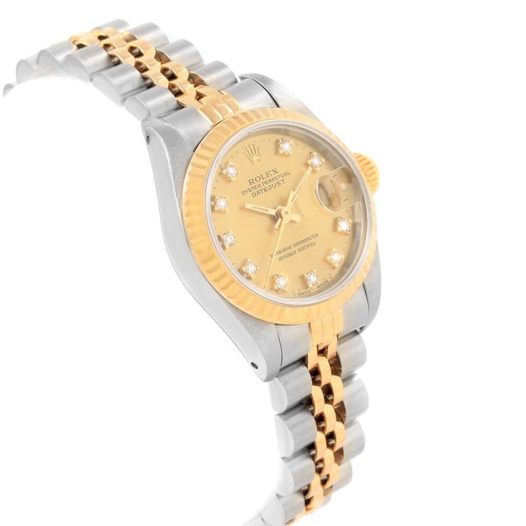 The image shows a Rolex Datejust 69173 Women's Stainless Steel Champagne Dial 69173 Women's Stainless Steel Champagne Dial watch at an angle showcasing its face, bezel, and two-tone bracelet.