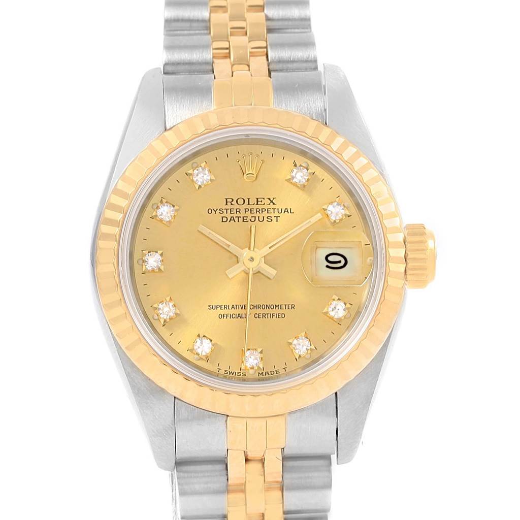 This image shows the face and bracelet of a Rolex Datejust 69173 Women's Stainless Steel Champagne Dial 69173 Women's Stainless Steel Champagne Dial watch, highlighting its gold dial, diamond hour markers, and two-tone bracelet.