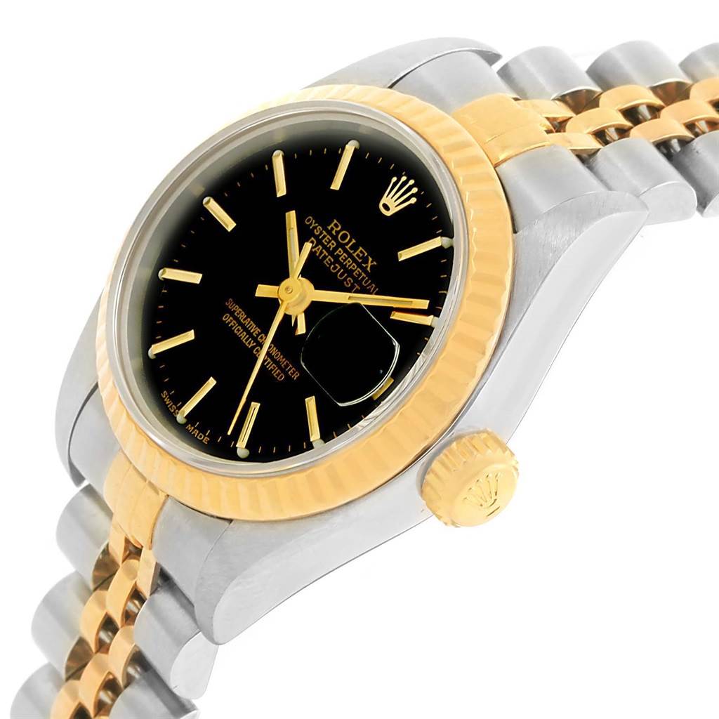 The Rolex Datejust 79173 Women's Steel and Gold (two tone) Black Dial 79173 Women's Steel and Gold (two tone) Black Dial watch is shown at an angle emphasizing the dial, crown, and part of the bracelet.
