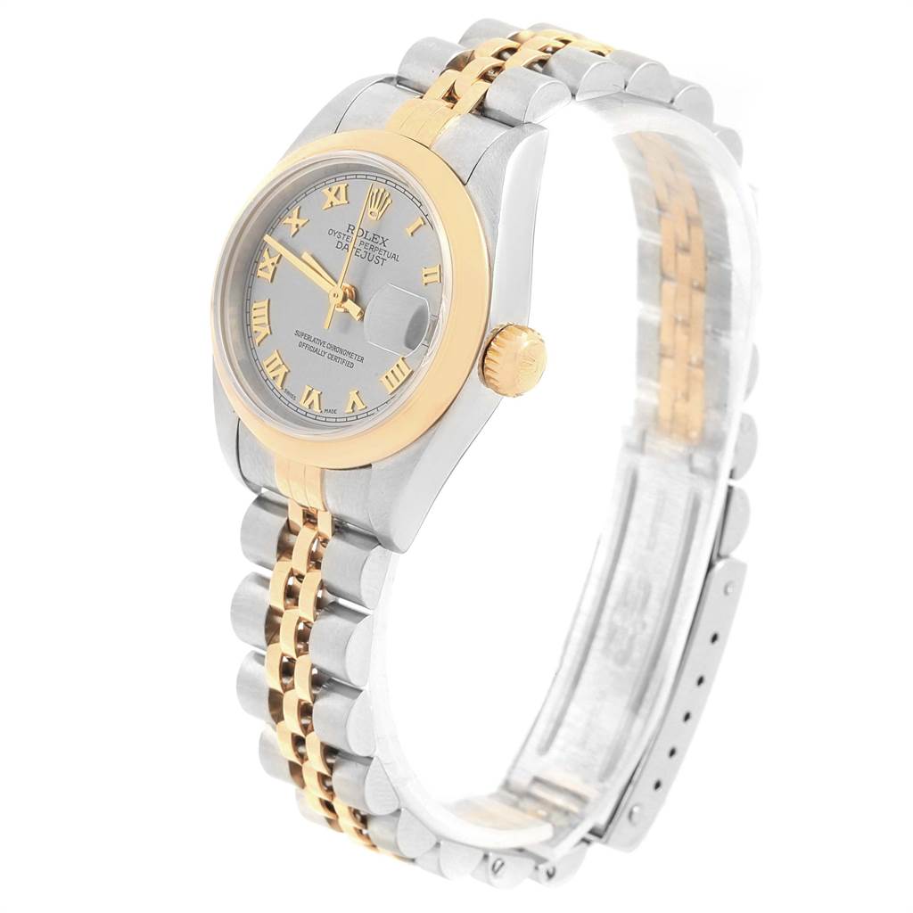 This image shows a side-angle view of the Rolex Datejust 79163 Women
s Steel and Gold (two tone) Grey Dial 79163 Women
s Steel and Gold (two tone) Grey Dial watch featuring the face, bezel, and Jubilee bracelet.