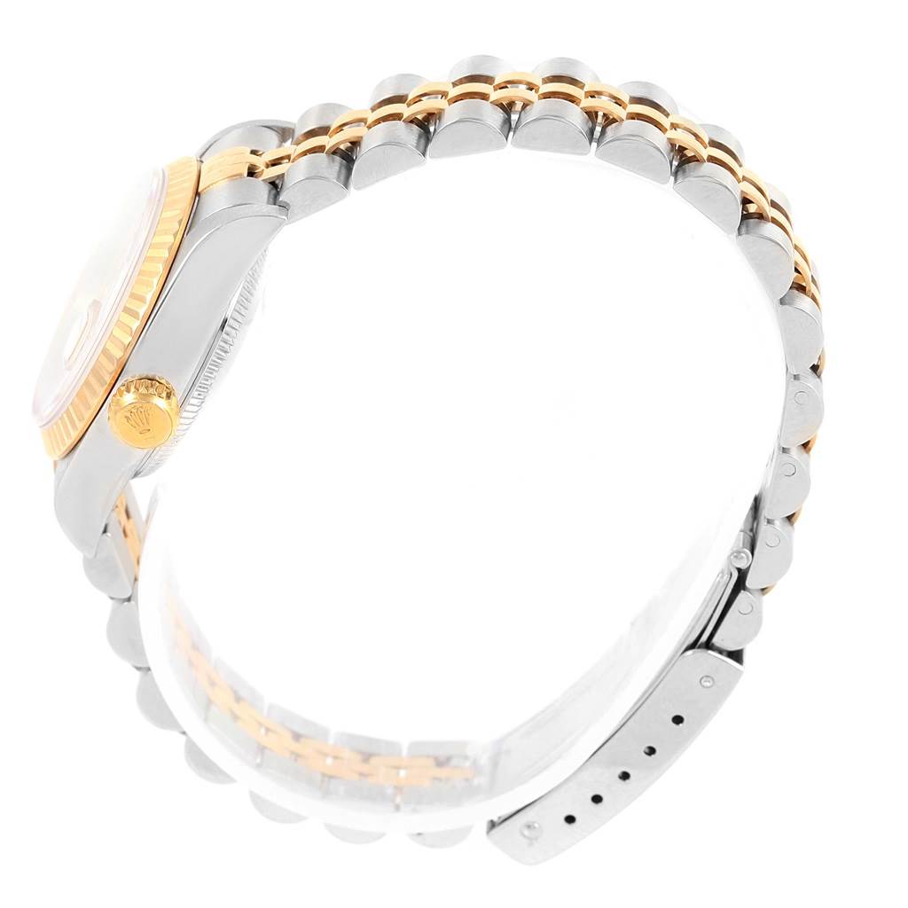 The image shows a side view of a Rolex Datejust 79173 Women's Steel and Gold (two tone) Champagne Dial 79173 Women's Steel and Gold (two tone) Champagne Dial watch, focusing on the bracelet, crown, and part of the case.