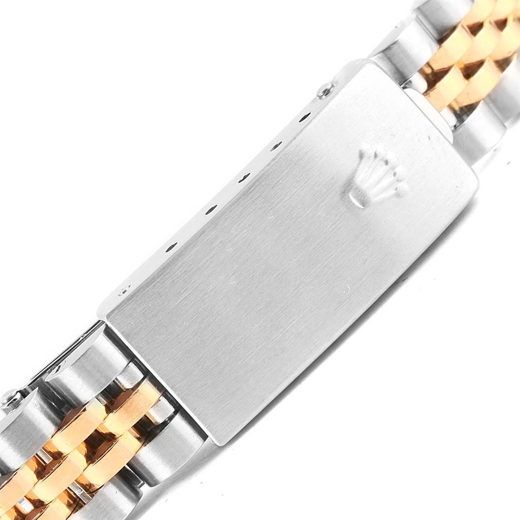 This image shows the clasp and part of the bracelet of a Rolex Datejust 79173 Women's Steel and Gold (two tone) Champagne Dial 79173 Women's Steel and Gold (two tone) Champagne Dial watch.