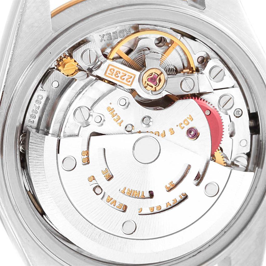 The image shows a close-up of the inner movement mechanism of a Rolex Datejust 79173 Women's Steel and Gold (two tone) Champagne Dial 79173 Women's Steel and Gold (two tone) Champagne Dial watch from the back angle.