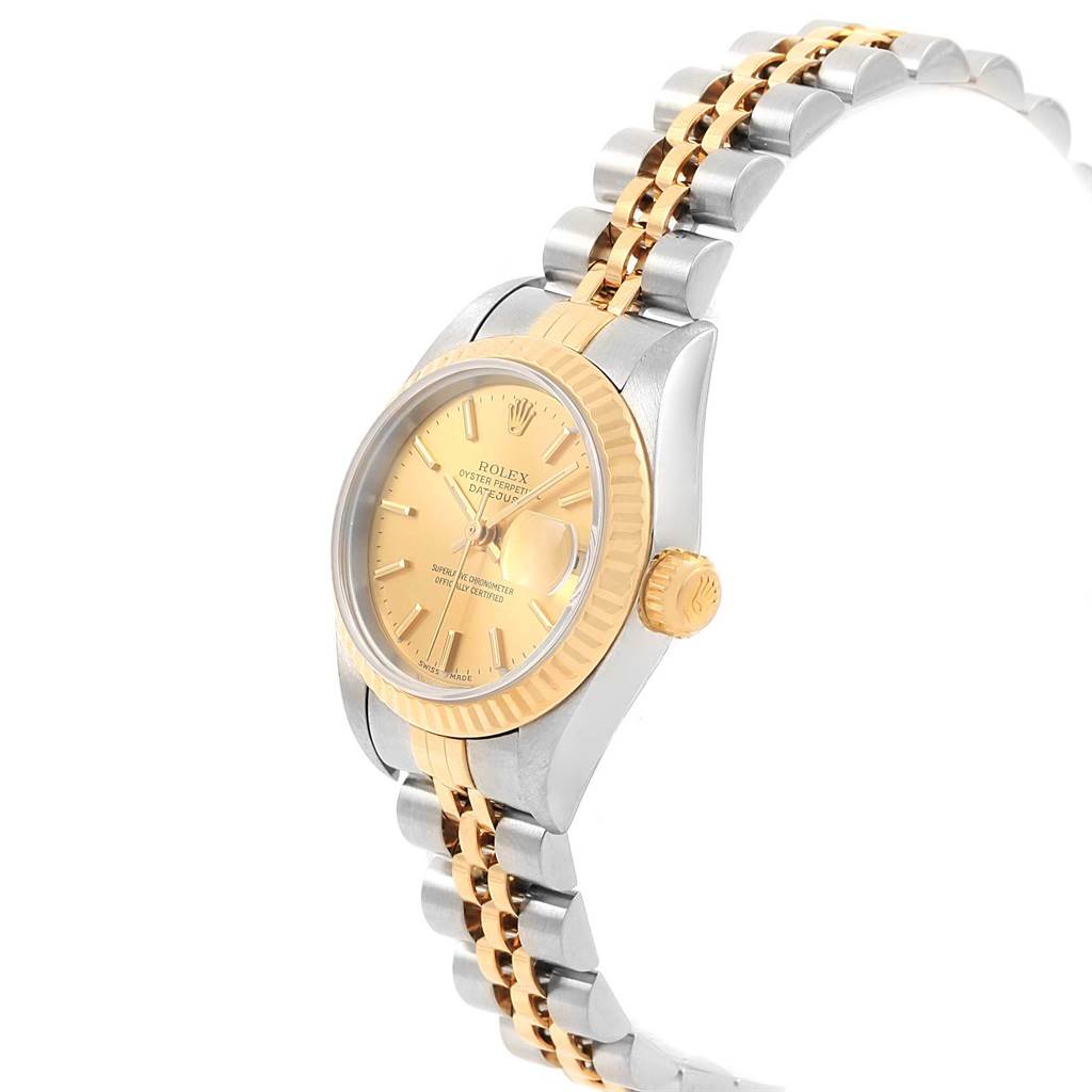 This image shows a side view of the Rolex Datejust 79173 Women's Steel and Gold (two tone) Champagne Dial 79173 Women's Steel and Gold (two tone) Champagne Dial watch, highlighting the dial, bezel, and part of the bracelet.