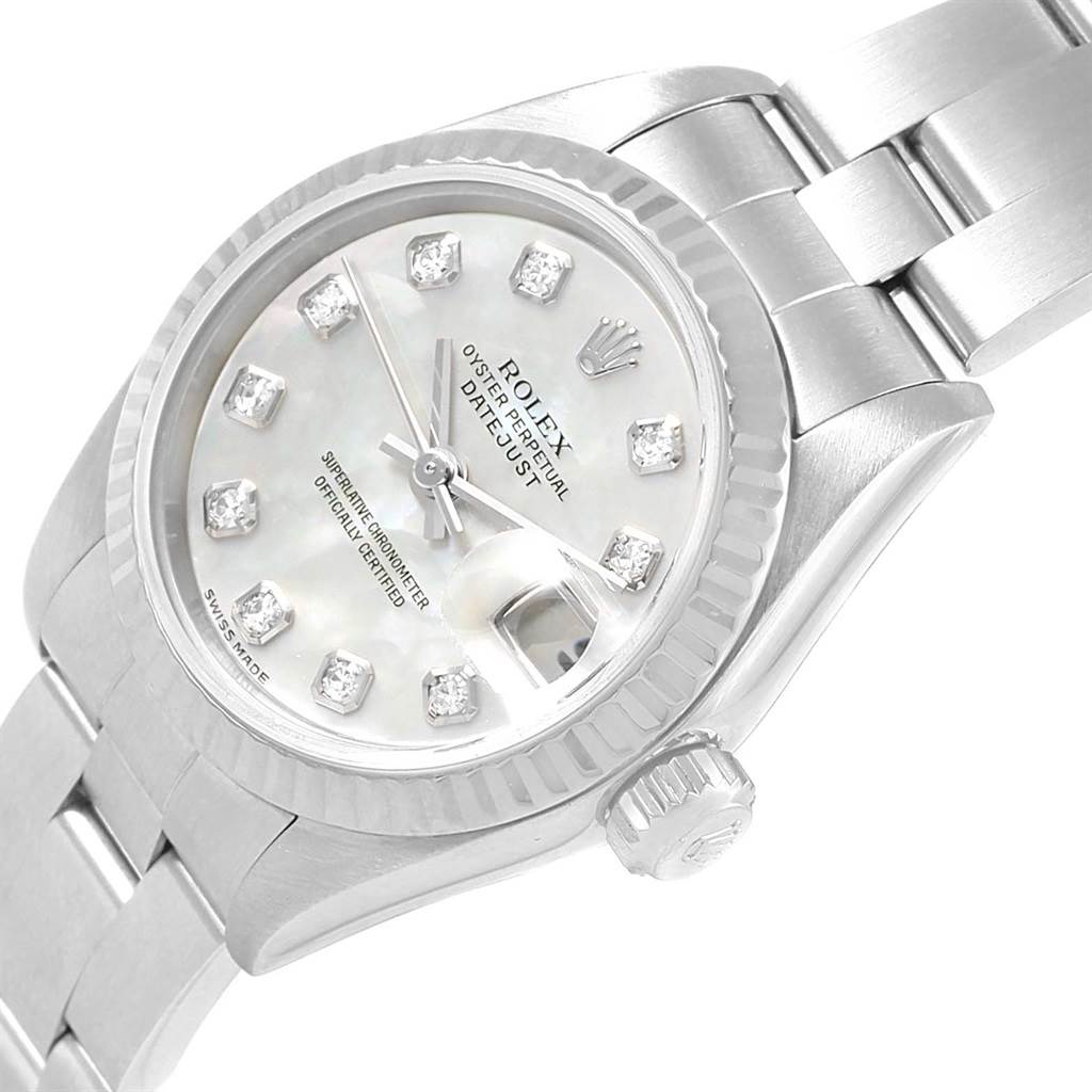 The image shows a close-up of a Rolex Datejust 79174 Women's Stainless Steel Mother of Pearl Dial 79174 Women's Stainless Steel Mother of Pearl Dial watch from an angled top view, highlighting the dial, bezel, crown, and part of the bracelet.