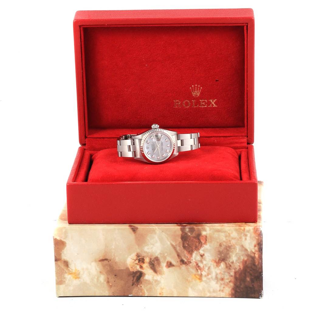 This is a Rolex Datejust 79174 Women's Stainless Steel Mother of Pearl Dial 79174 Women's Stainless Steel Mother of Pearl Dial watch displayed front-facing inside a red Rolex box.
