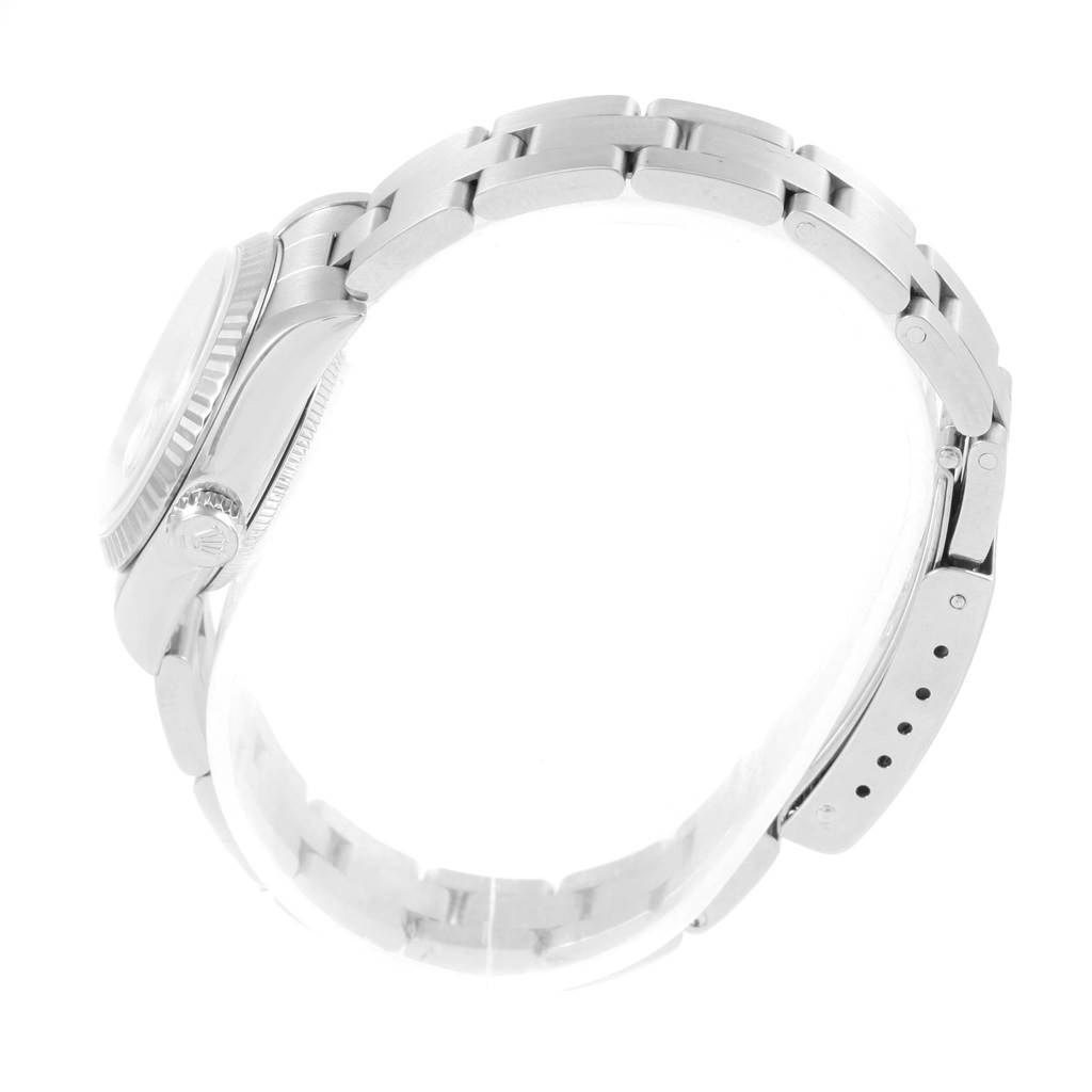 The image shows a side view of the Rolex Datejust 79174 Women's Stainless Steel Mother of Pearl Dial 79174 Women's Stainless Steel Mother of Pearl Dial watch, highlighting the bracelet, crown, and side of the case.