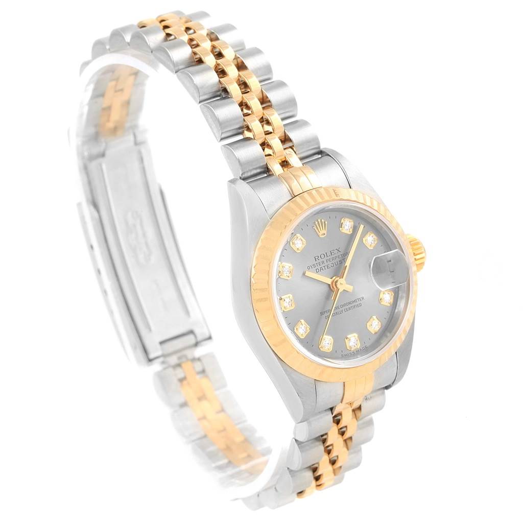 This image shows a Rolex Datejust 79173 Women's Stainless Steel Silver Dial 79173 Women's Stainless Steel Silver Dial model watch at an angle highlighting its face, bezel, and two-tone band.