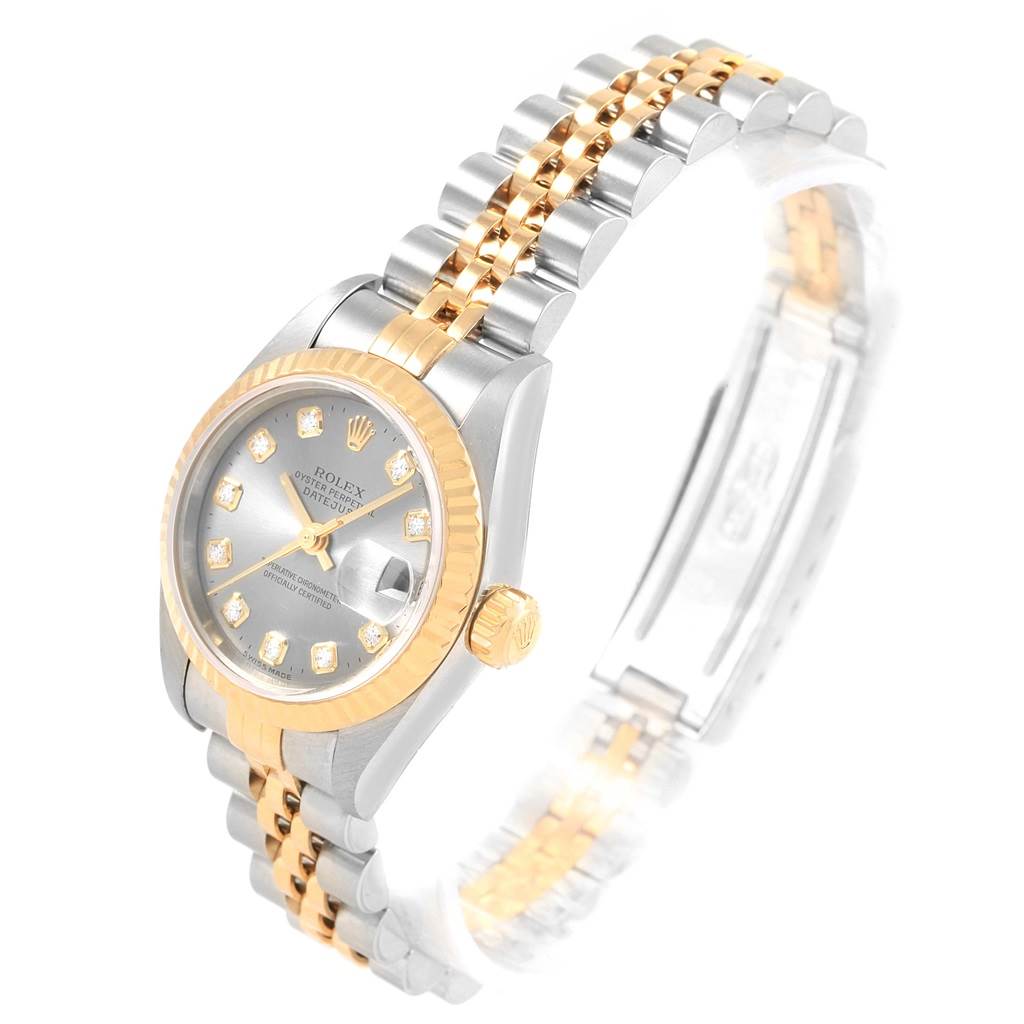 The Rolex Datejust 79173 Women's Stainless Steel Silver Dial 79173 Women's Stainless Steel Silver Dial watch is shown at an angle highlighting the bracelet, crown, watch face, and part of the clasp.