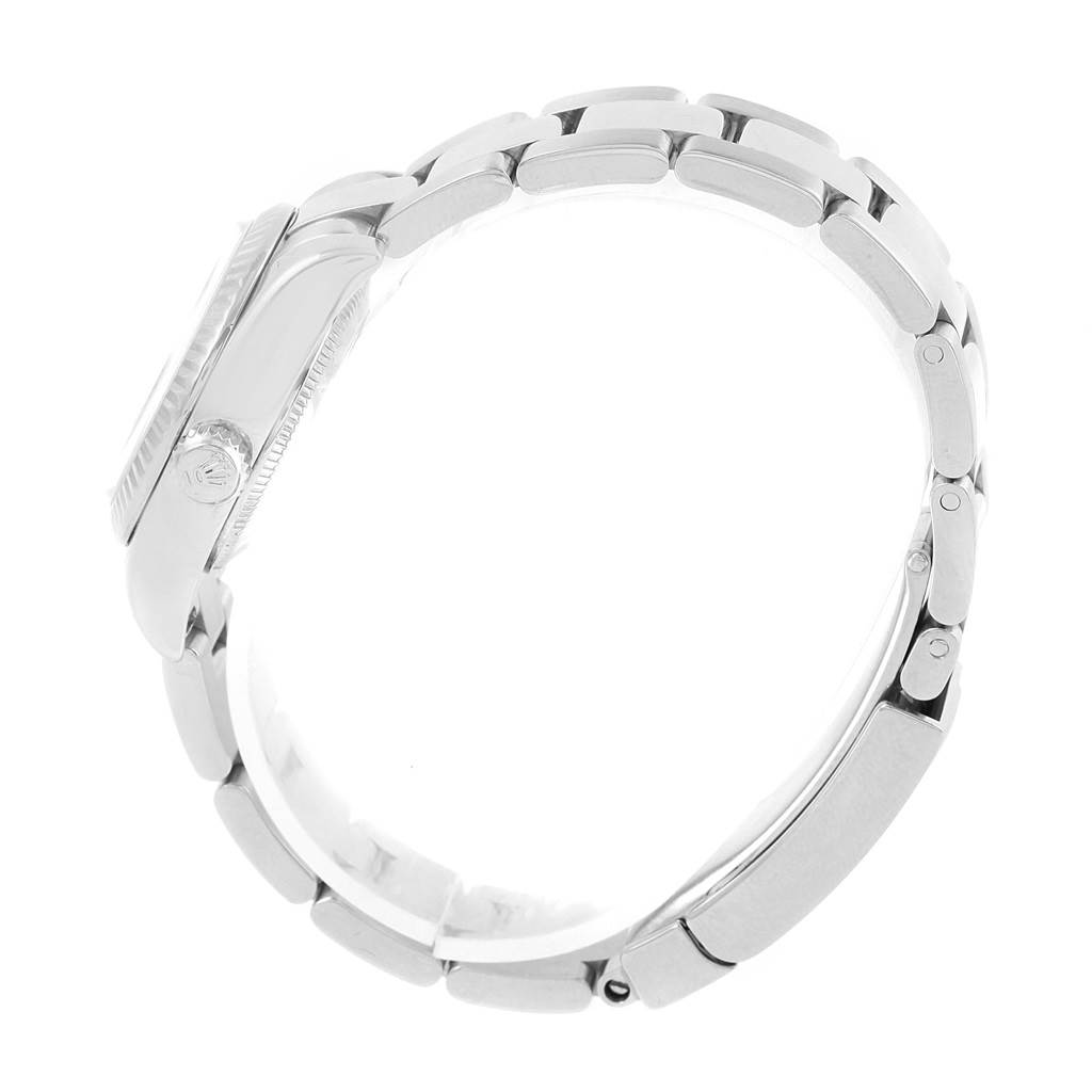 The image shows a side view of the Rolex Datejust 179174 Women's Stainless Steel Mother of Pearl Dial 179174 Women's Stainless Steel Mother of Pearl Dial watch, highlighting the bracelet and crown.